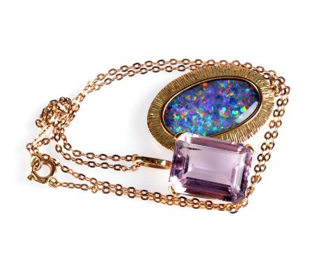 An opal gold mounted pendant and an amethyst pendant.