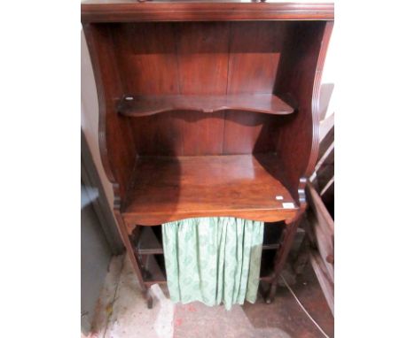 A narrow Regency style bookcase with a single open shelf above a curtained, adjustable shelf.