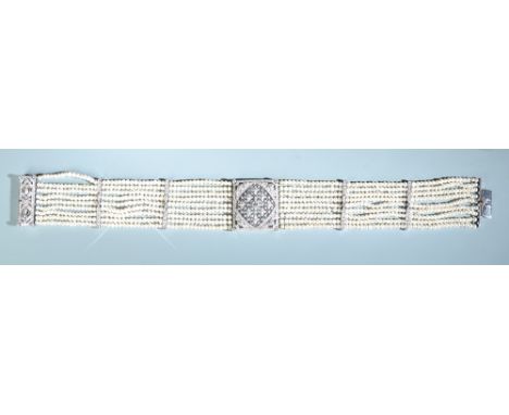 A spectacular 18ct. white gold diamond and pearl choker in the Belle Epoch manner.