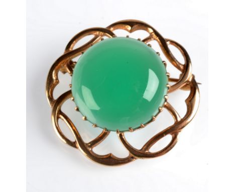 A 9ct. gold Celtic style brooch set with a central circular green agate cabochon, diameter 3.2cm.
