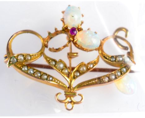 A 9ct. gold Art Nouveau opal, pearl and ruby brooch.