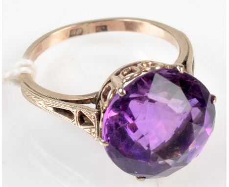 An amethyst ring. 