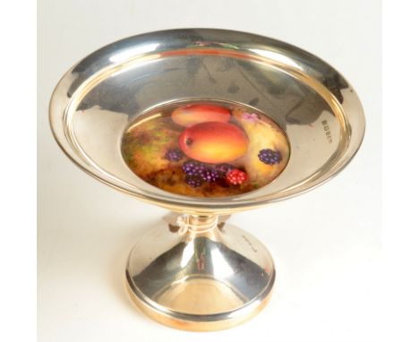 A tazza set with a fruit enamelled plaque, in Worcester style, signed W.Bee, height 12cm, diameter 16.3cm. Condition Report: 