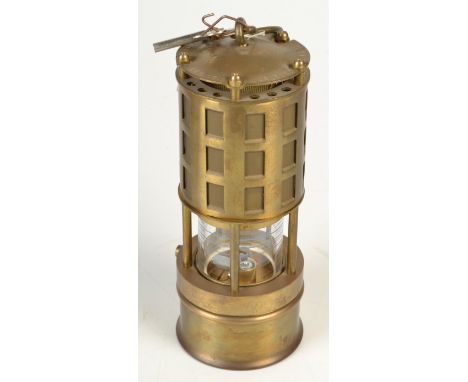 An American brass Koehler flame safety lamp, height excluding suspension hook 24.5cm.