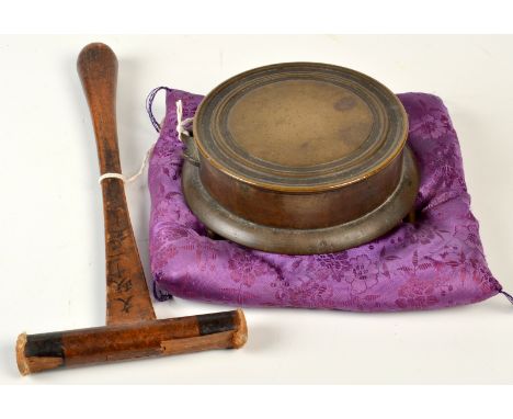 A Japanese priest's twelfth year, fifth month of Tensho circular bronze gong, the underside cast with calligraphy and raised 