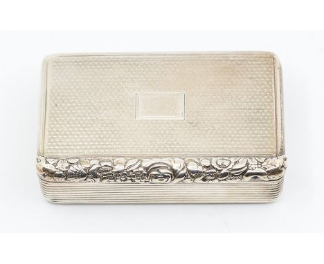 A George III silver snuff box, engraved cover and base with wiggle work, reeded sides and foliage thumbpiece, hallmarked by T