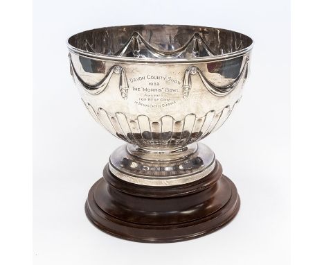 Agricultural Interest: A Victorian silver large punch bowl, the body chased with swags above gadroon section, the body with e