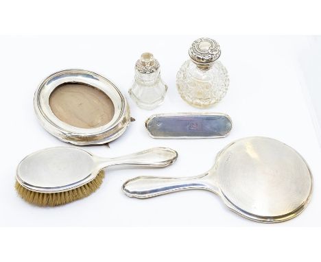 A collection of silver to include:&nbsp;early 20th Century silver mounted dressing table to include a&nbsp;mirror &amp; brush