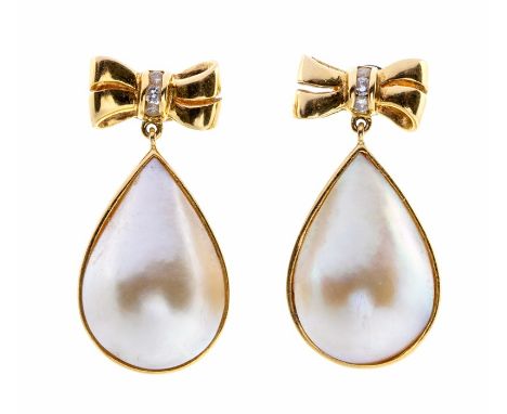 A pair of Mabe blister pearl and diamond 18ct gold drop earrings, comprising diamond set bow tops, each set with three channe