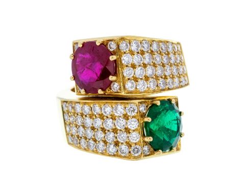 An emerald, ruby and diamond ring, by Loris Abate Milan circa 1980, comprising a cross over design each side grain set with f