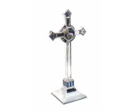 An Arts & Crafts silver mounted cross with enamel decoration in the manner of Edward Spencer for Artificer's Guild, the centr