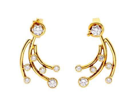 A pair of two way diamond and 18ct gold earrings, comprising a round brilliant cut top, claw set within a circular gold surro