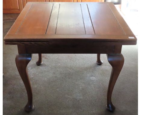1920's draw leaf table. Approx. 74cm H x 92cm W x 84cm D

Used condition, scuffs and scratches 