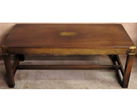 20th century campaign style brass bound coffee table on stretchered supports. Approx. 43cm H x 107cm W x 46cm D

Reasonable u