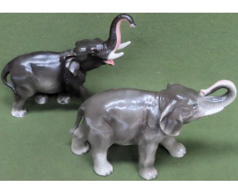 Two continental glazed ceramic elephant figures, stamped to underside, possibly Sitzendorf. Largest Approx. 26cms H

reasonab