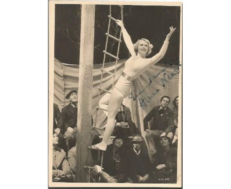 Anna Neagle  signed 7 x 5 inch sepia photo nice mage on rope ladder in Circus Big Top Good condition. All signed items come w