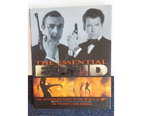 James Bond actors signed book. Large hardback edition of The Essential Bond - The Authorized Guide to the World of 007. Signe