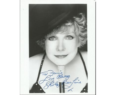 Shirley Maclaine autographed photo. Classic 8x10 portrait photo autographed by actress and singer Shirley Maclaine. Dedicated