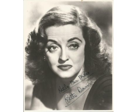 Bette Davis signed 10 x 8 inch b/w portrait photo to Mrs Miles, couple dings other wise good Good condition. All signed items