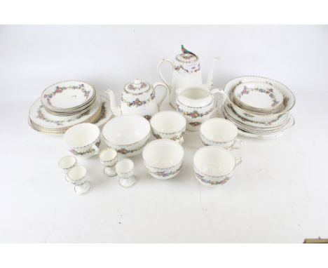 A vintage Crown Staffordshire tea, coffee and dinner service. Including coffee pot, tea pot, jug, five cups, etc. Max. H20cm