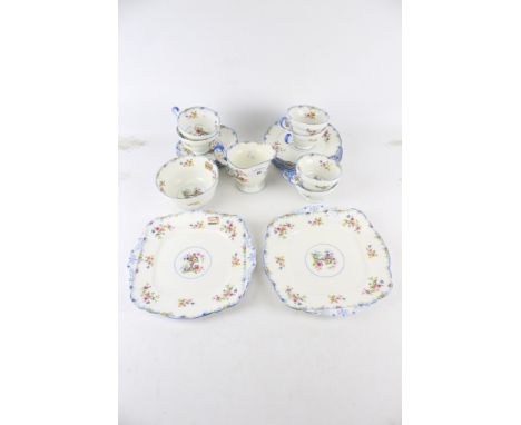 For Lawleys by Paragon bone china tea set. Including six cups and saucers, milk jug and sugar bowl, etc. Max. H9.5cm