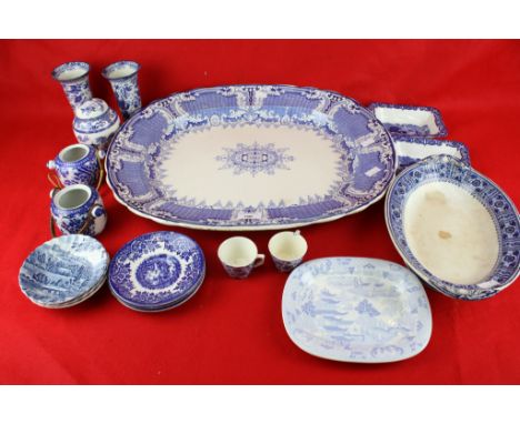 A collection of blue and white ceramics. Including a Victorian platter, a pair of Burleigh Ware oriental vases, cups and sauc