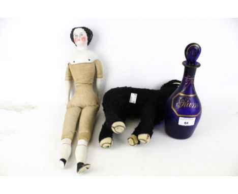Vintage Collectables. Including ceramic mannequin doll, a vintage toy donkey and a blue glass 'rum' decanter with stopper, gu