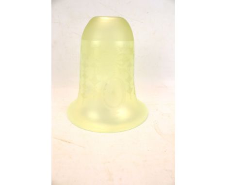 A single vaseline glass acid etched lamp shade. Ribbon and swag decoration, H12.5cm Condition Report: Collar opening size app