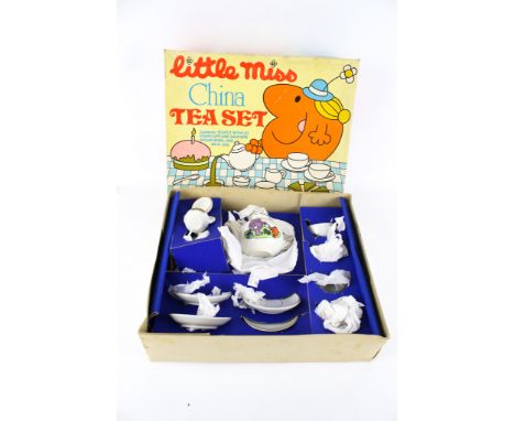 A JotaStar Toy Roger Hargreaves 'Little Miss' china tea set boxed. Including tea pot, four cups and saucers, etc. L32cm x D27