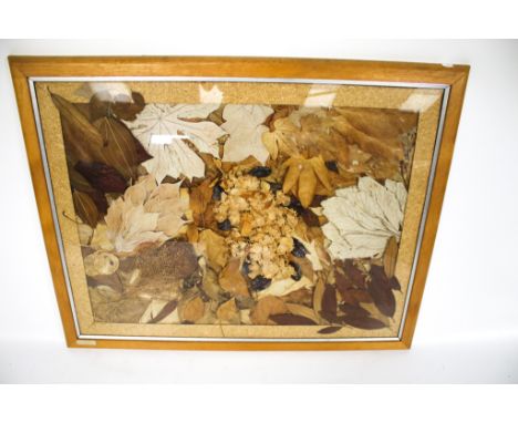 A contemporary piece of art. Featuring a collage of leaves, 72.5cm x 96cm, framed and glazed