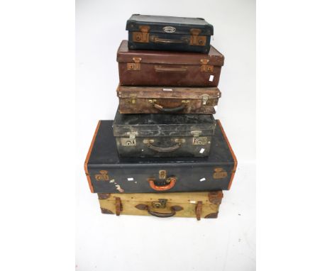Six vintage suitcases. Canvas and leather examples, all with a single handle and latches, Max L74cm