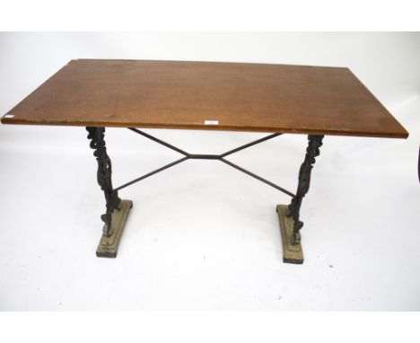 A vintage rectangular pub table. With cast iron supports and stretchers, L121cm x D60cm x H73cm