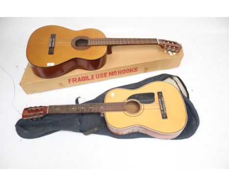Two vintage acoustic guitars. Including a Lorenza classical acoustic guitar model no. 91 and another with the label of Selmer