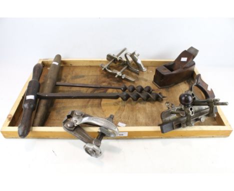 A collection of six assorted vintage wood working tools. Including a Stanley No. 45 plough plane, etc. 