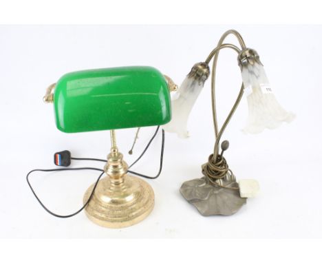Two contemporary table lamps. Comprising a desk lamp with a brass frame and green shade, H36cm, the other with a metal frame 