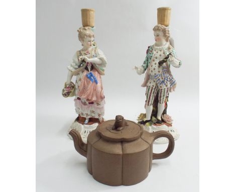 Pair of continental figural porcelain candlestick bases and a Chinese Yixing teapot with lion finial.  Candlestick height 30c