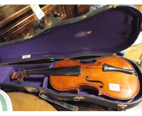 Violin in case bearing Stradivarius label 