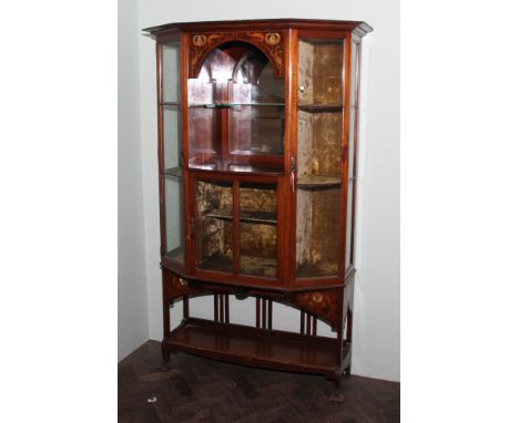 Edwardian arts and crafts shaped front mahogany display cabinet with inlay and mother of pearl decorative panels, interior mi