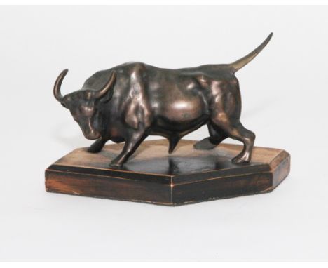 Bronze model of a bull on a shaped ebonised base 17cm wide including base   Condition - ebonised finish on base has worn off