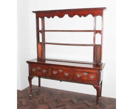 Early 18th century oak dresser fitted 3 drawers with brass drop handles standing on pad feet and open shelf back fitted 2 sma