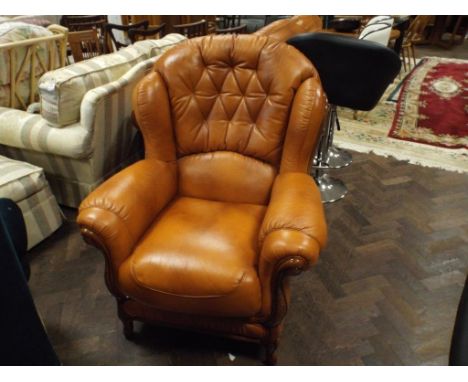 Tan leather 2 seater high back sofa, show wood frame and matching armchair 