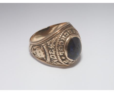 Gents 10 k gold fraternity ring, set with cabochon blue stone, marked Temple High School .Ring size O