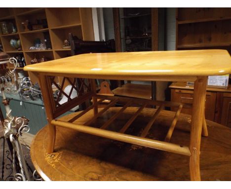 Light pine varnished coffee table on bamboo style base 