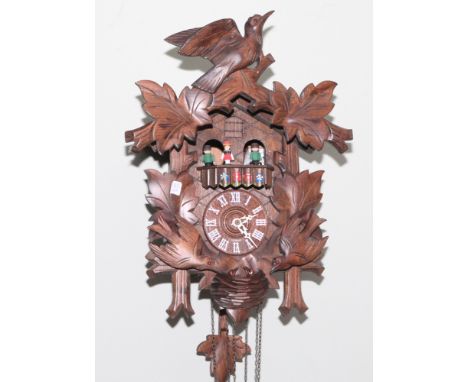 Black Forest style cuckoo clock with weights 