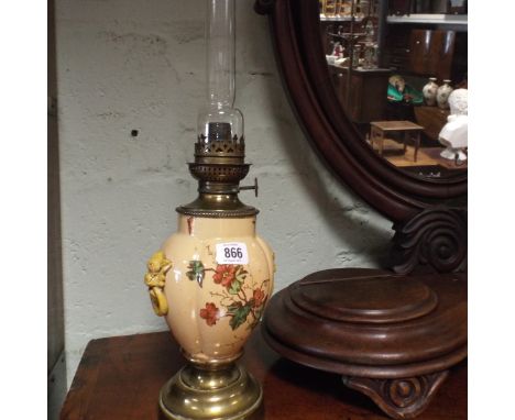 French porcelain and brass oil lamp 