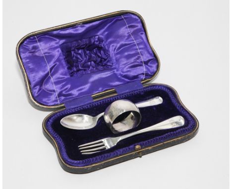 Early 20th century 3 piece silver christening set comprising spoon fork and napkin ring, engraved with initials. Sheffield 19