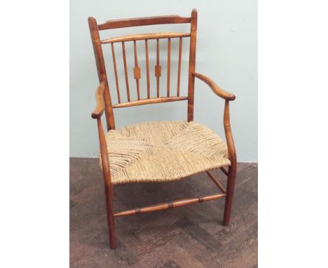 Yew wood stick back elbow chair with rush seat