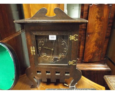 American striking shelf clock in arts and crafts style oak case 