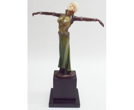 Contemporary bronze of an art deco style lady on a black marble base 30cm tall 