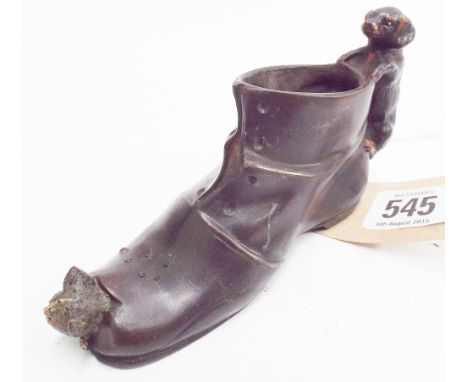Novelty cold painted bronze modelled as a Dachshund chasing a kitten through an old boot - 15cm long  